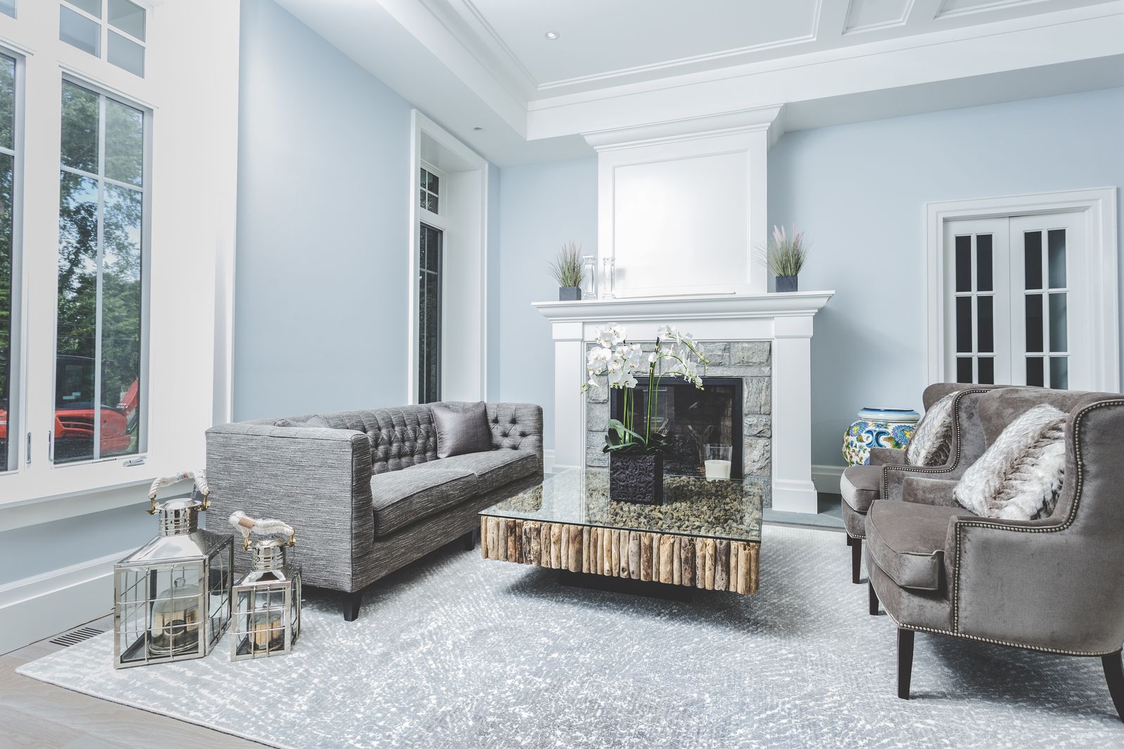 Custom fireplace mantel and coffered ceiling millwork by Division Seven Millwork